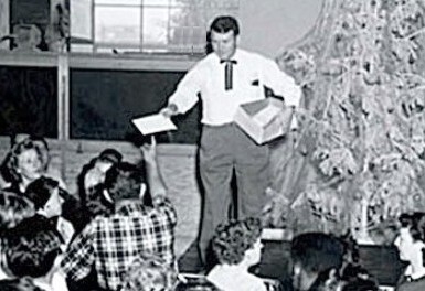 Bill Hewlett distributing bonus checks in 1954.